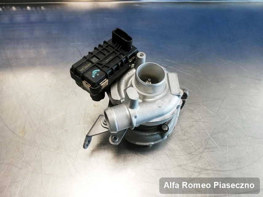 Zregenerowana w laboratorium w Piasecznie turbina do aut  firmy Alfa Romeo na stole w laboratorium po regeneracji przed wysyłką