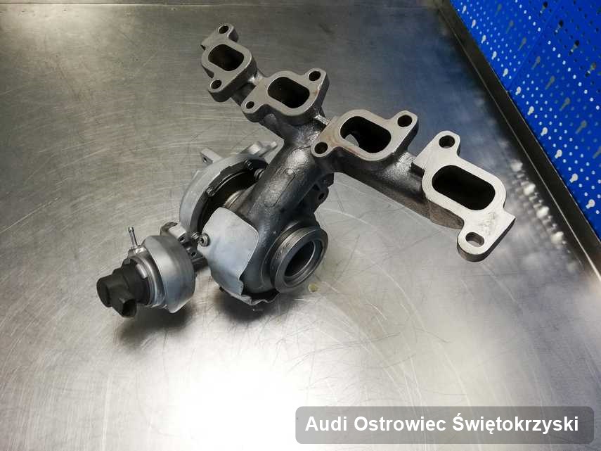 Wyremontowana w firmie w Ostrowcu Świętokrzyskim turbosprężarka do samochodu z logo Audi przyszykowana w laboratorium po regeneracji przed spakowaniem