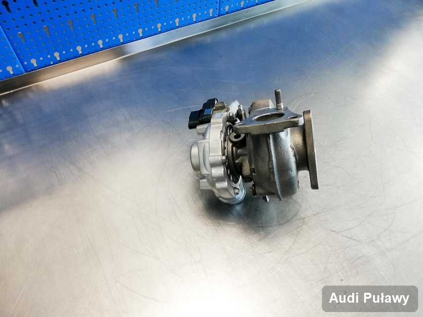 Wyczyszczona w przedsiębiorstwie w Puławach turbina do aut  marki Audi przyszykowana w warsztacie po regeneracji przed spakowaniem