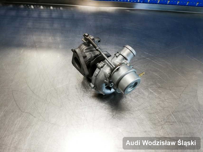 Naprawiona w pracowni regeneracji w Wodzisławiu Śląskim turbina do samochodu z logo Audi przygotowana w laboratorium naprawiona przed spakowaniem