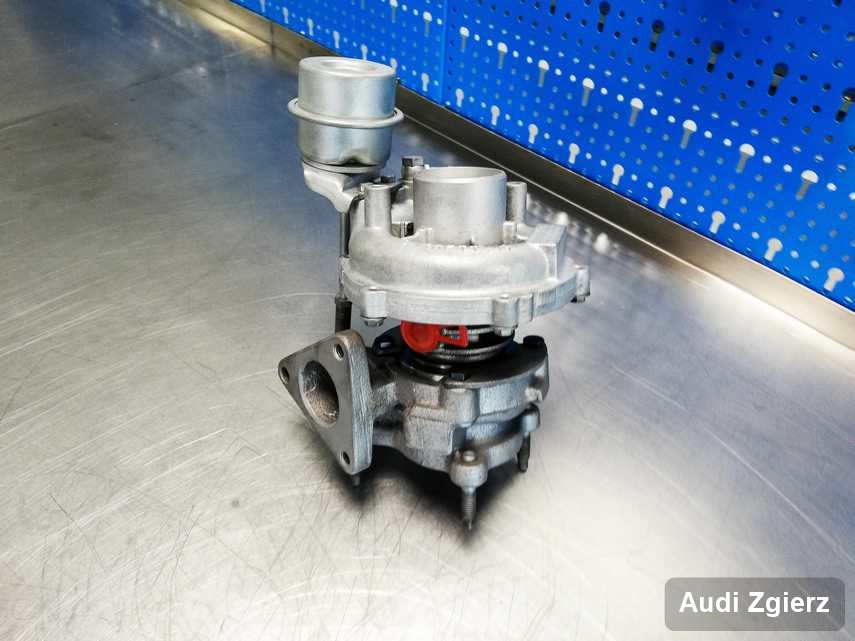 Wyczyszczona w firmie w Zgierzu turbosprężarka do osobówki marki Audi przygotowana w laboratorium po remoncie przed nadaniem