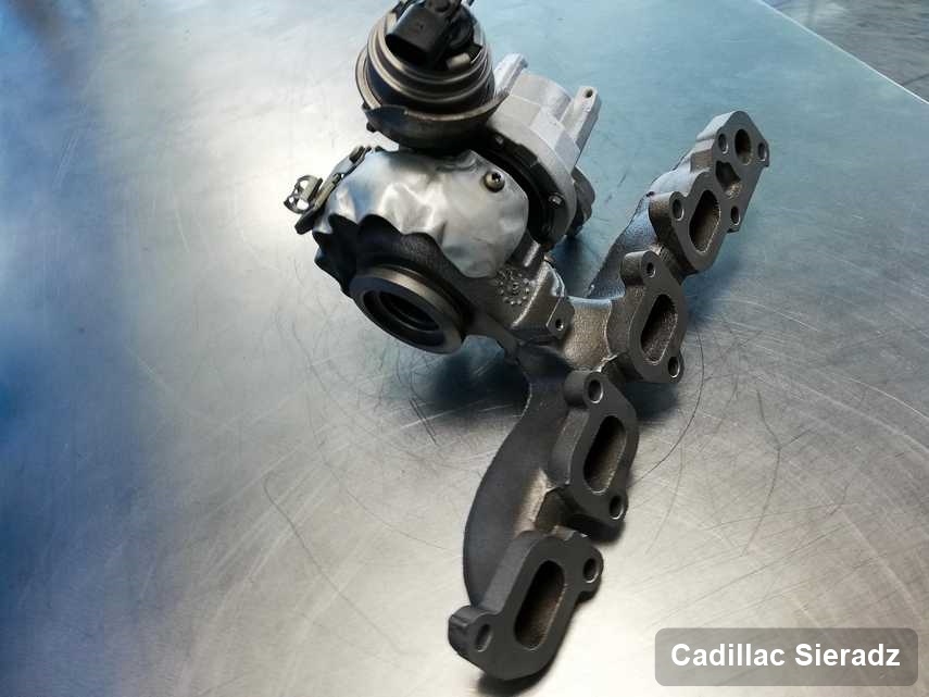 Naprawiona w firmie w Sieradzu turbosprężarka do aut  marki Cadillac przygotowana w warsztacie po naprawie przed spakowaniem