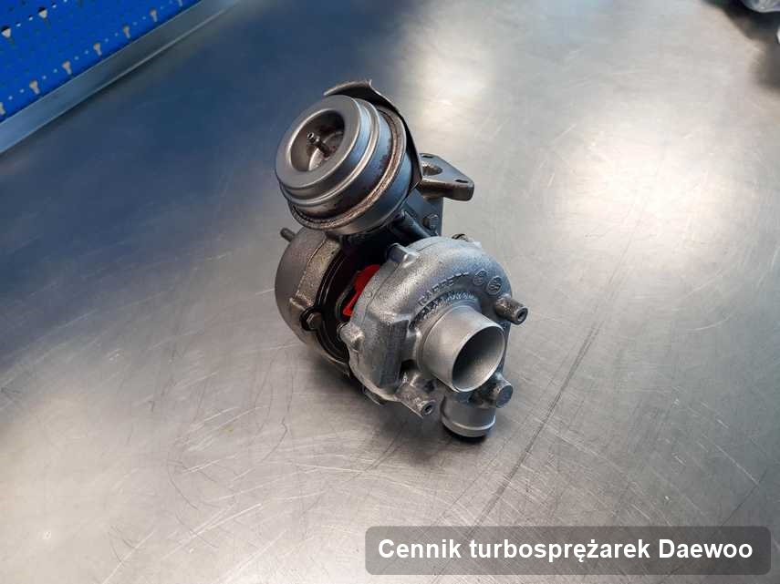 Turbosprężarka do osobówki z logo Daewoo zregenerowana w laboratorium gdzie przeprowadza się  serwis Cennik turbosprężarek