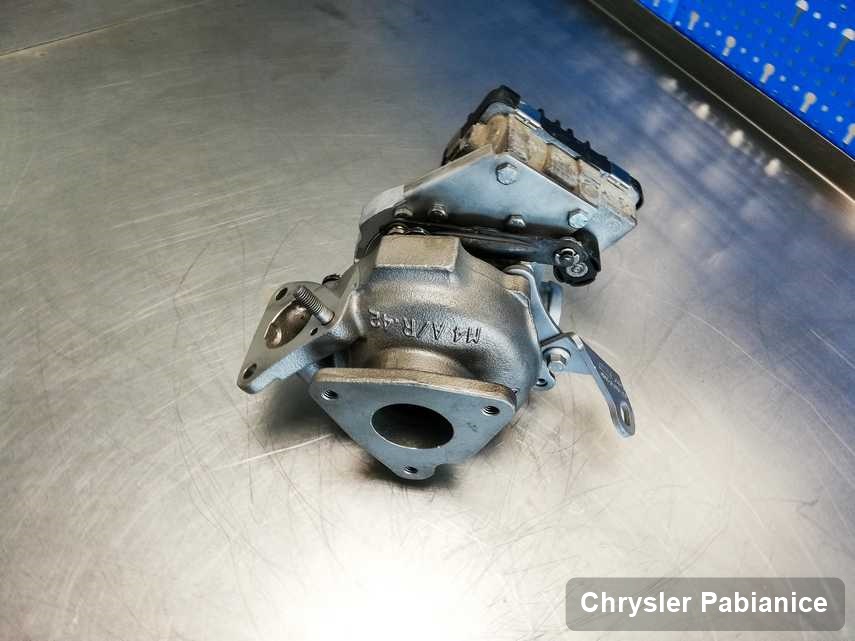 Zregenerowana w przedsiębiorstwie w Pabianicach turbosprężarka do osobówki koncernu Chrysler przygotowana w laboratorium po regeneracji przed wysyłką