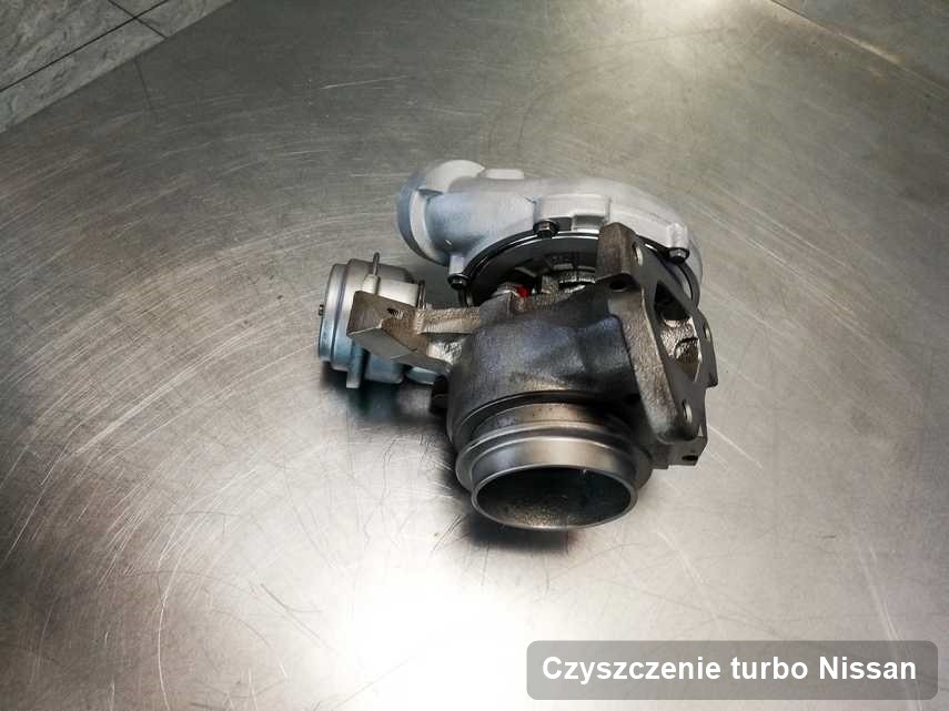 Turbosprężarka do osobówki firmy Nissan zregenerowana w laboratorium gdzie przeprowadza się  usługę Czyszczenie turbo