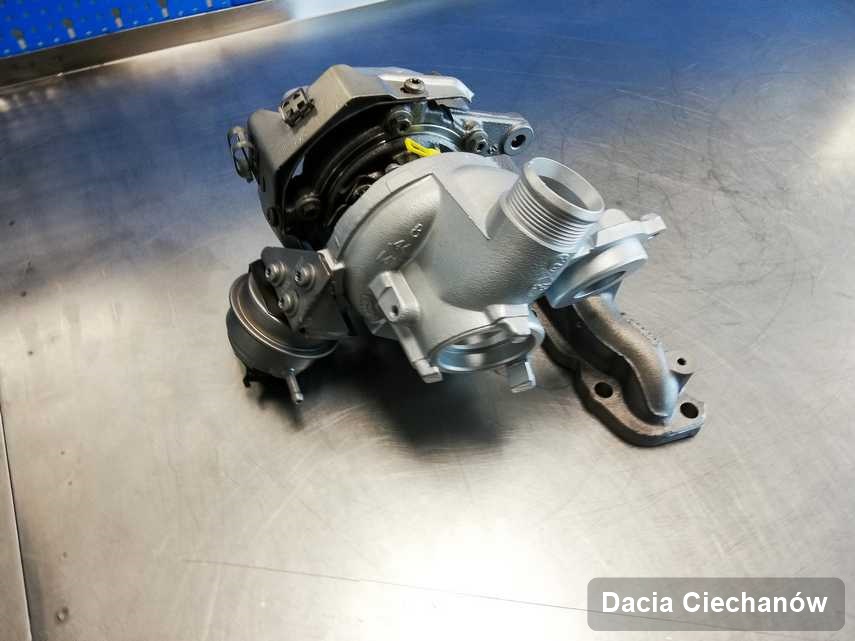 Zregenerowana w pracowni regeneracji w Ciechanowie turbosprężarka do pojazdu z logo Dacia przyszykowana w laboratorium zregenerowana przed nadaniem