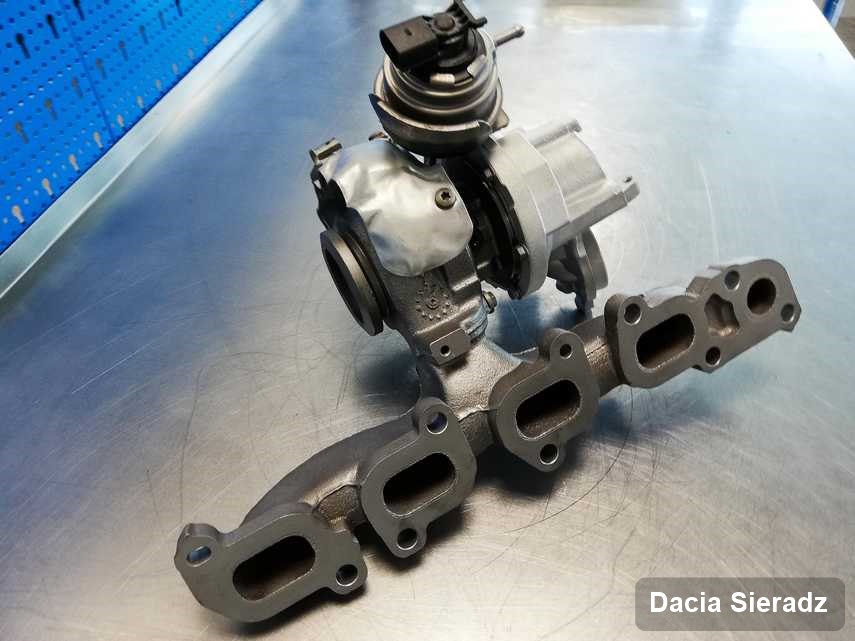 Zregenerowana w pracowni regeneracji w Sieradzu turbosprężarka do samochodu spod znaku Dacia przygotowana w warsztacie po naprawie przed nadaniem
