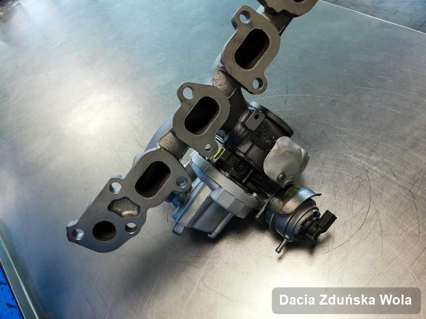 Wyremontowana w firmie w Zduńskiej Woli turbosprężarka do auta koncernu Dacia przyszykowana w laboratorium po remoncie przed nadaniem