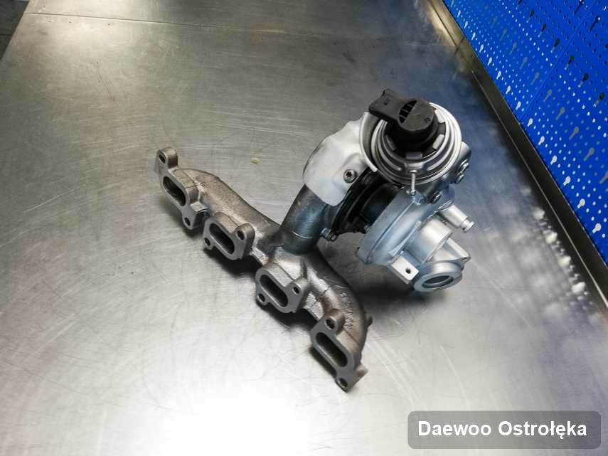 Naprawiona w firmie w Ostrołęce turbosprężarka do aut  producenta Daewoo przygotowana w warsztacie po naprawie przed wysyłką