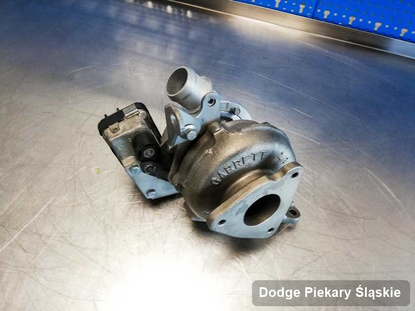 Zregenerowana w firmie w Piekarach Śląskich turbosprężarka do aut  spod znaku Dodge przygotowana w warsztacie po naprawie przed wysyłką