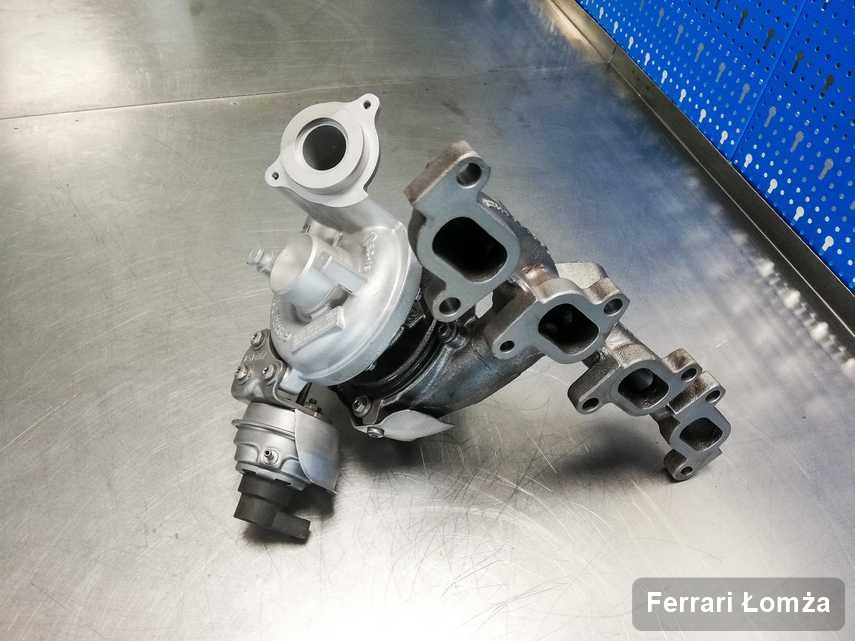 Zregenerowana w przedsiębiorstwie w Łomży turbosprężarka do auta spod znaku Ferrari przygotowana w warsztacie po naprawie przed spakowaniem
