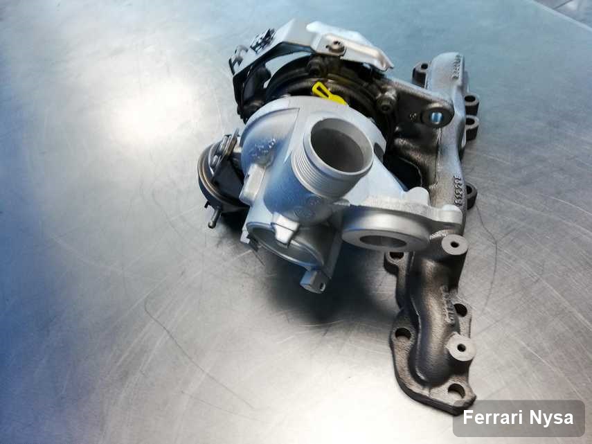 Wyremontowana w pracowni regeneracji w Nysie turbosprężarka do pojazdu z logo Ferrari przyszykowana w warsztacie zregenerowana przed wysyłką
