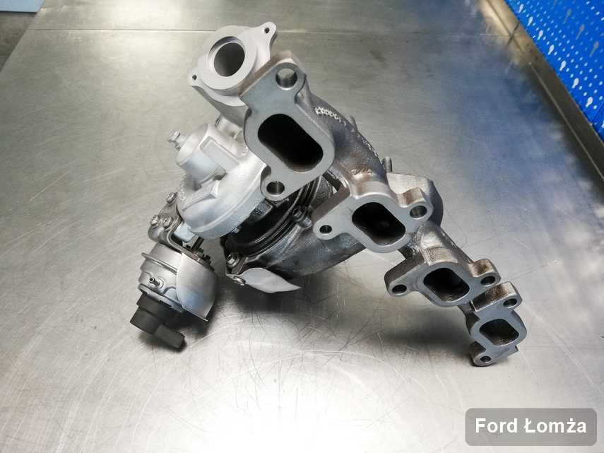 Zregenerowana w firmie zajmującej się regeneracją w Łomży turbosprężarka do pojazdu spod znaku Ford przyszykowana w pracowni po regeneracji przed spakowaniem