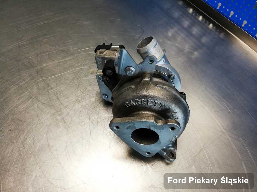 Wyremontowana w laboratorium w Piekarach Śląskich turbosprężarka do samochodu koncernu Ford przyszykowana w warsztacie po regeneracji przed nadaniem