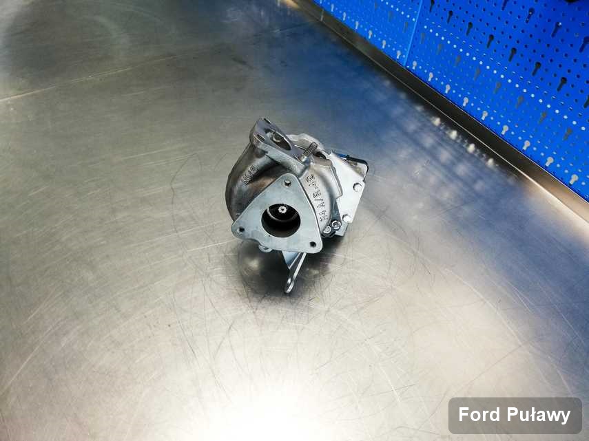 Wyczyszczona w laboratorium w Puławach turbosprężarka do pojazdu koncernu Ford przygotowana w pracowni po regeneracji przed spakowaniem