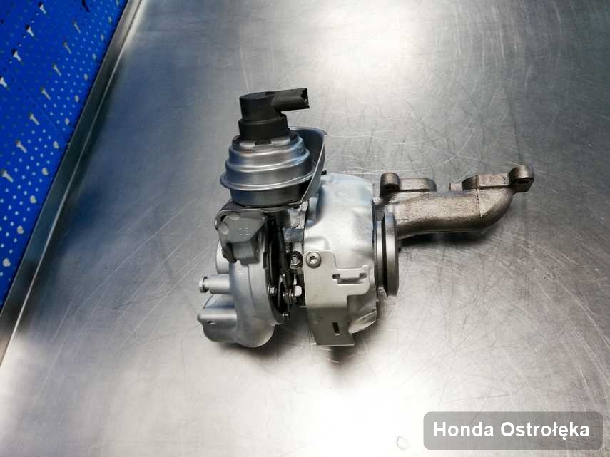 Wyremontowana w laboratorium w Ostrołęce turbosprężarka do pojazdu z logo Honda przyszykowana w warsztacie naprawiona przed spakowaniem