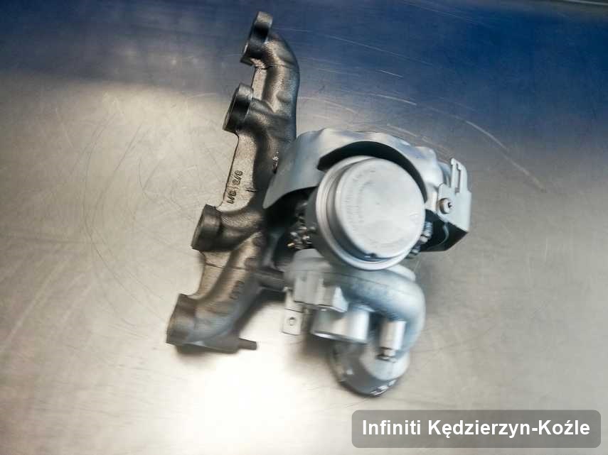 Zregenerowana w firmie zajmującej się regeneracją w Kędzierzynie-Koźlu turbosprężarka do osobówki marki Infiniti na stole w laboratorium po regeneracji przed nadaniem