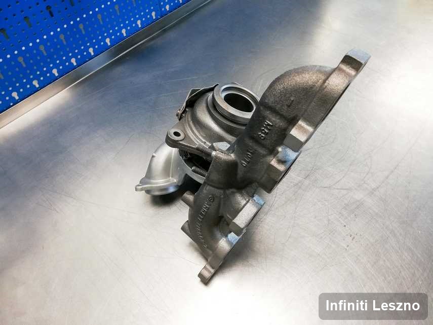 Naprawiona w pracowni w Lesznie turbosprężarka do samochodu producenta Infiniti przyszykowana w pracowni naprawiona przed nadaniem