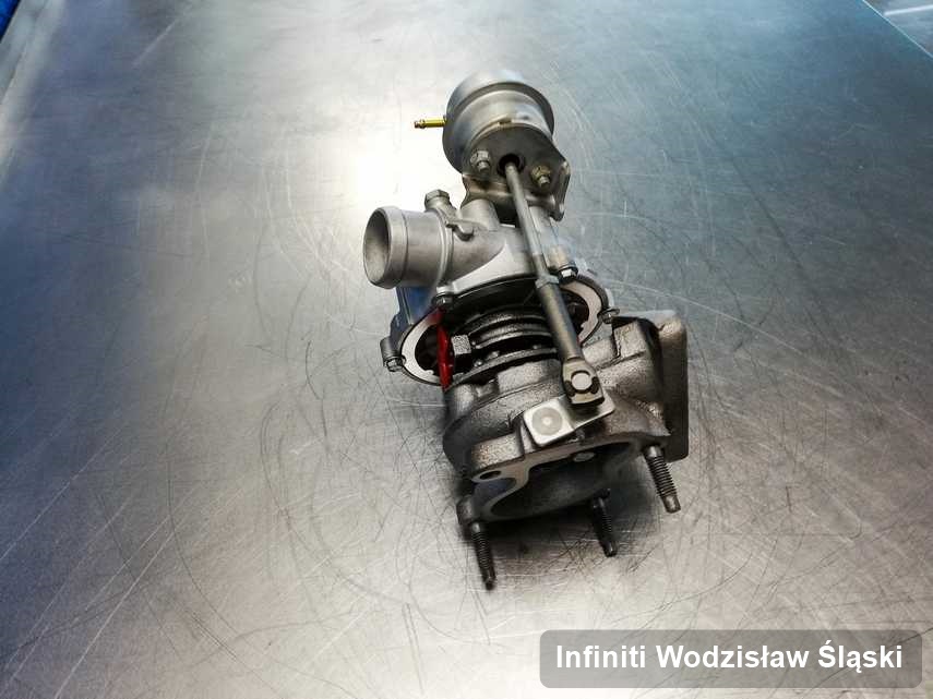 Naprawiona w firmie zajmującej się regeneracją w Wodzisławiu Śląskim turbosprężarka do samochodu z logo Infiniti przygotowana w laboratorium naprawiona przed spakowaniem