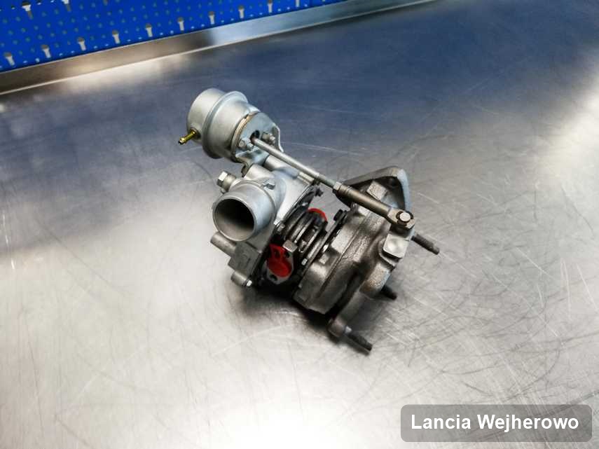 Naprawiona w firmie w Wejherowie turbosprężarka do auta z logo Lancia przyszykowana w warsztacie wyremontowana przed nadaniem