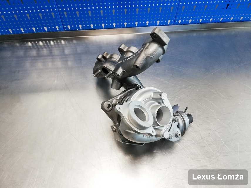Zregenerowana w firmie zajmującej się regeneracją w Łomży turbosprężarka do osobówki spod znaku Lexus na stole w laboratorium po regeneracji przed wysyłką