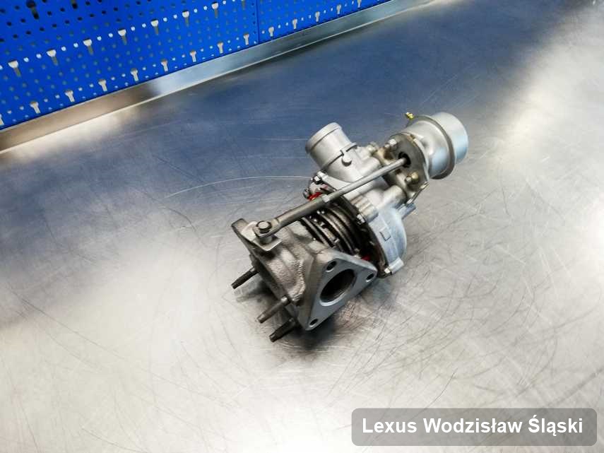 Naprawiona w pracowni regeneracji w Wodzisławiu Śląskim turbosprężarka do aut  spod znaku Lexus na stole w pracowni naprawiona przed wysyłką