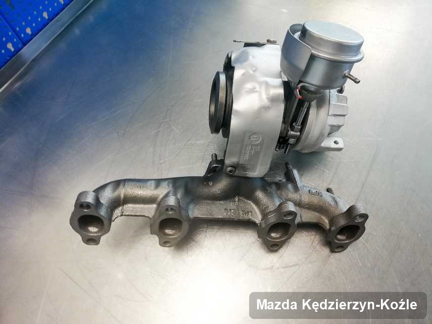 Wyremontowana w przedsiębiorstwie w Kędzierzynie-Koźlu turbosprężarka do pojazdu spod znaku Mazda przygotowana w pracowni po naprawie przed nadaniem