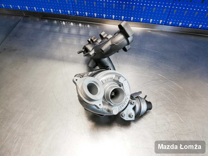 Wyczyszczona w pracowni w Łomży turbosprężarka do aut  producenta Mazda przygotowana w pracowni naprawiona przed nadaniem