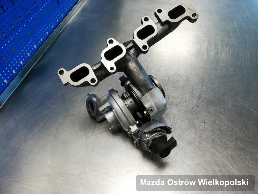 Wyremontowana w pracowni w Ostrowie Wielkopolskim turbosprężarka do aut  producenta Mazda przyszykowana w pracowni wyremontowana przed spakowaniem