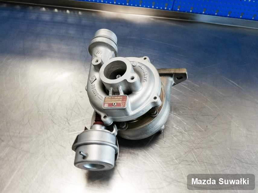 Zregenerowana w pracowni regeneracji w Suwałkach turbosprężarka do samochodu producenta Mazda przyszykowana w pracowni po remoncie przed spakowaniem