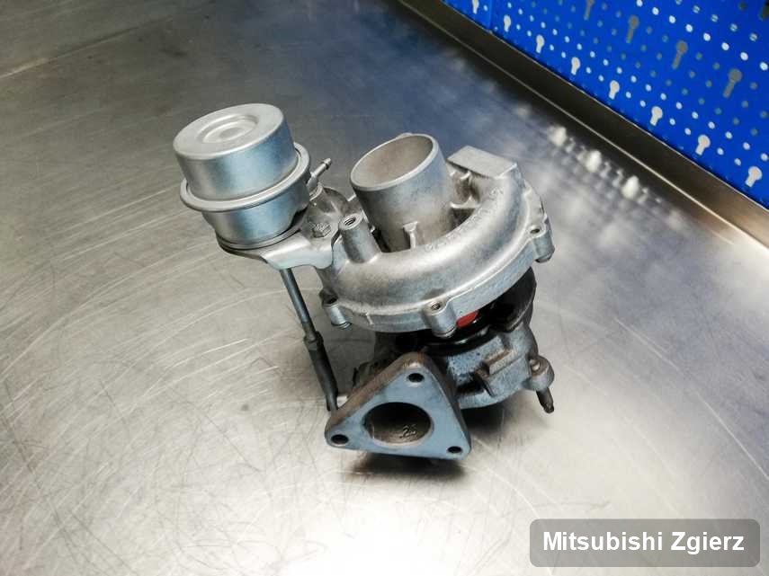 Naprawiona w pracowni w Zgierzu turbina do osobówki z logo Mitsubishi przyszykowana w warsztacie po naprawie przed wysyłką