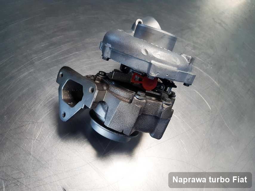 Turbosprężarka do diesla sygnowane logiem Fiat po naprawie w pracowni gdzie przeprowadza się  serwis Naprawa turbo