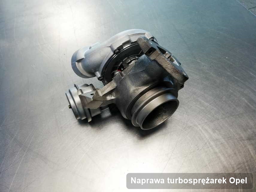 Turbina do samochodu osobowego sygnowane logiem Opel wyczyszczona w pracowni gdzie zleca się usługę Naprawa turbosprężarek