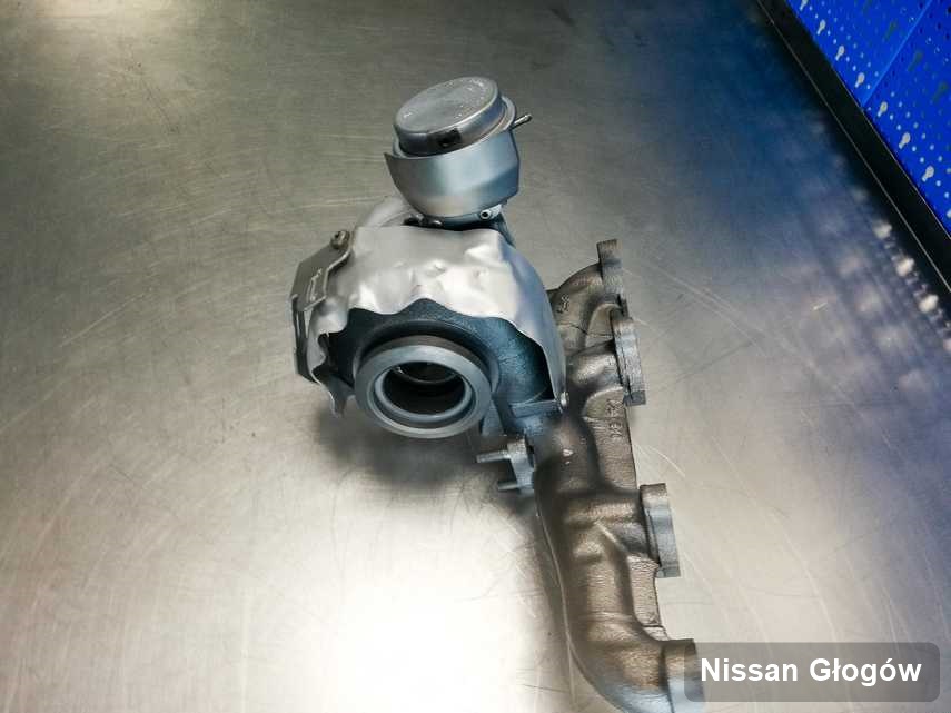 Naprawiona w przedsiębiorstwie w Głogowie turbosprężarka do aut  koncernu Nissan przyszykowana w pracowni po remoncie przed spakowaniem