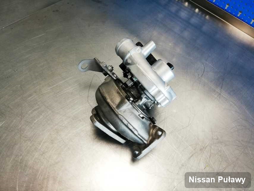 Wyczyszczona w pracowni regeneracji w Puławach turbosprężarka do osobówki spod znaku Nissan przyszykowana w warsztacie naprawiona przed spakowaniem