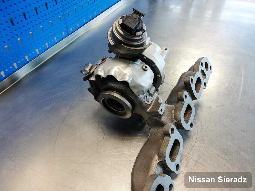 Wyczyszczona w przedsiębiorstwie w Sieradzu turbina do aut  producenta Nissan przyszykowana w warsztacie po regeneracji przed nadaniem