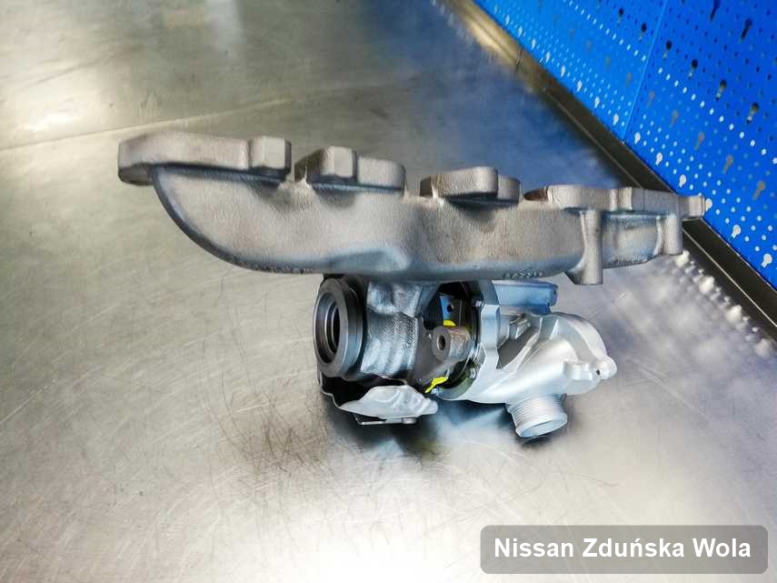 Wyczyszczona w przedsiębiorstwie w Zduńskiej Woli turbina do auta spod znaku Nissan na stole w laboratorium wyremontowana przed nadaniem