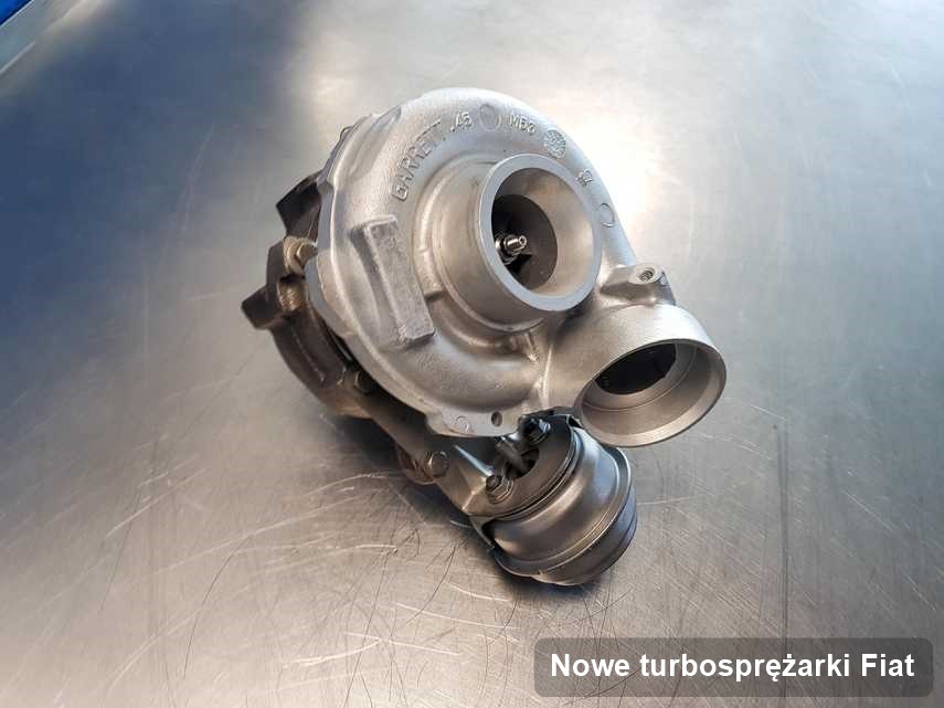 Turbosprężarka do samochodu osobowego producenta Fiat wyczyszczona w warsztacie gdzie realizuje się usługę Nowe turbosprężarki