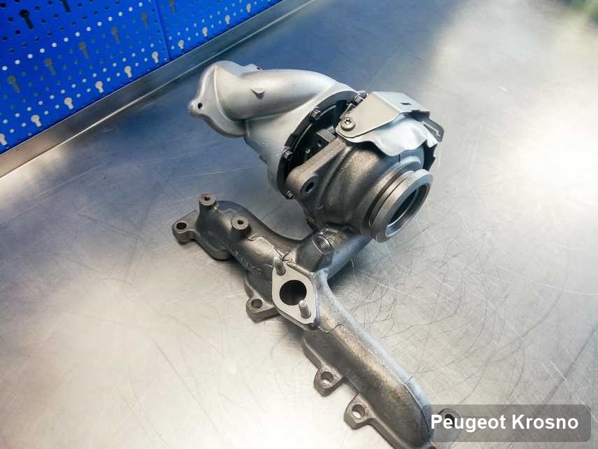 Wyczyszczona w firmie zajmującej się regeneracją w Krosnie turbina do aut  spod znaku Peugeot przygotowana w warsztacie po remoncie przed spakowaniem