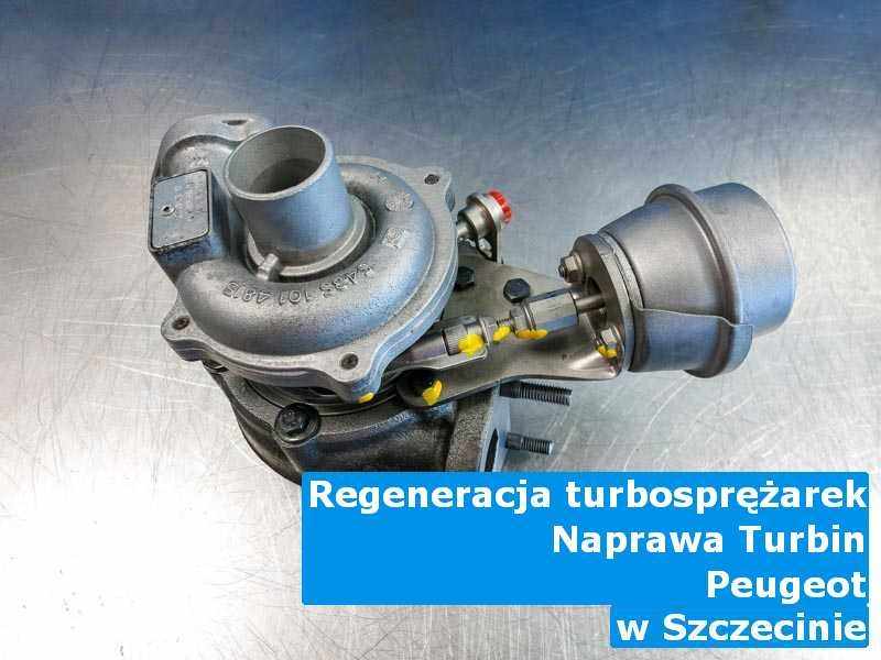 Wyczyszczona w firmie w Szczecinie turbosprężarka do samochodu firmy Peugeot na stole w warsztacie po remoncie przed spakowaniem
