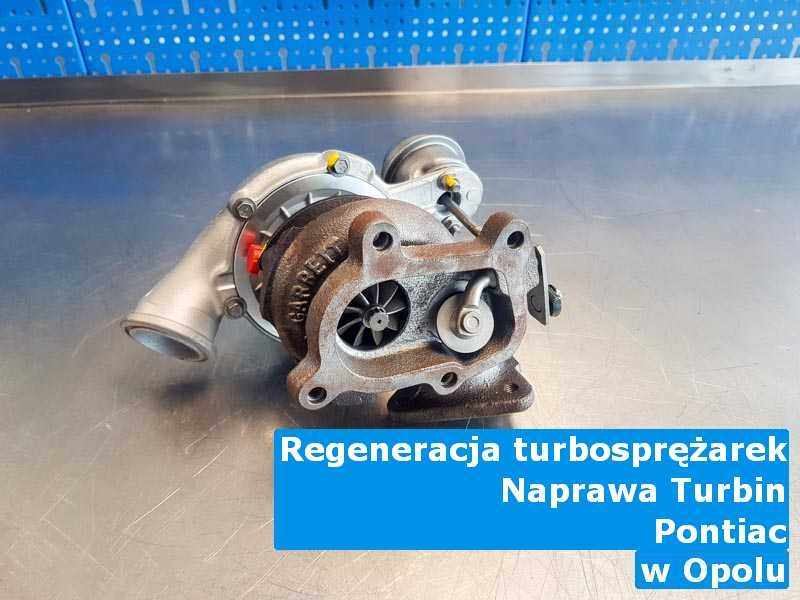 Wyremontowana w firmie w Opolu turbosprężarka do osobówki z logo Pontiac przygotowana w laboratorium po naprawie przed spakowaniem