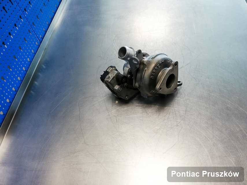 Zregenerowana w firmie w Pruszkowie turbosprężarka do samochodu firmy Pontiac przyszykowana w laboratorium po regeneracji przed spakowaniem