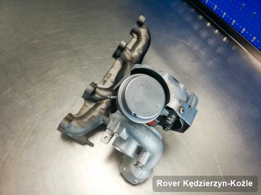 Wyremontowana w firmie w Kędzierzynie-Koźlu turbosprężarka do auta z logo Rover przyszykowana w pracowni po remoncie przed wysyłką