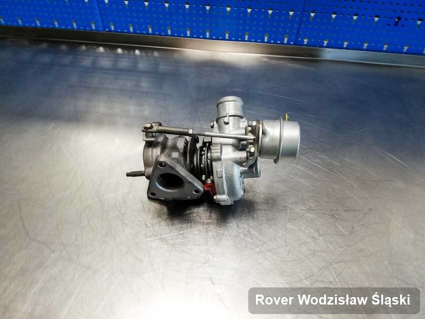 Zregenerowana w firmie w Wodzisławiu Śląskim turbosprężarka do osobówki koncernu Rover na stole w warsztacie naprawiona przed spakowaniem